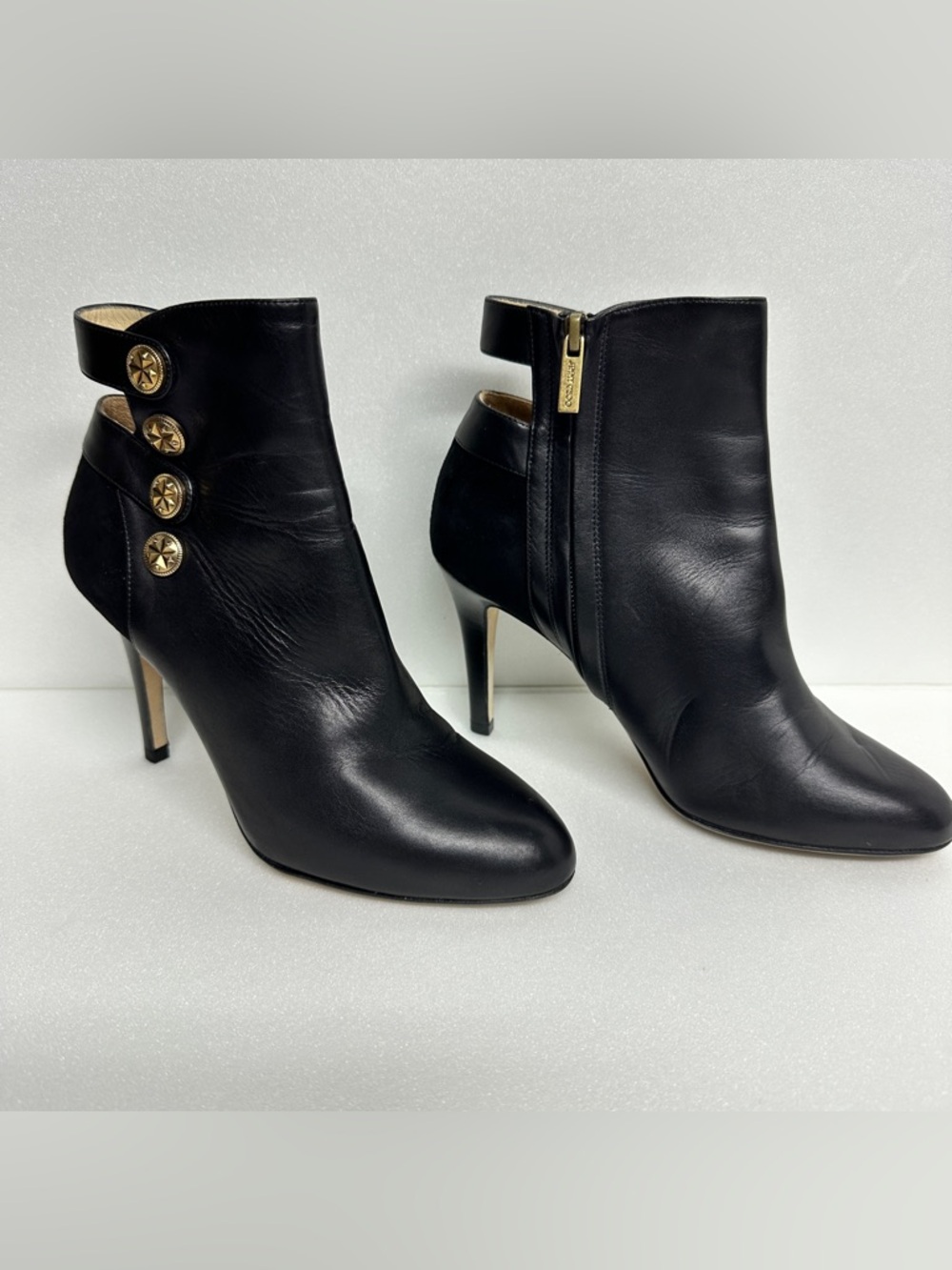 Jimmy Choo black leather stiletto ankle boots with Gold Button Accents luxury